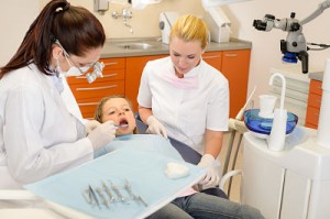 http://www.dreamstime.com/royalty-free-stock-photos-dental-assistant-dentist-little-child-image24925848